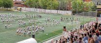 Al voltant de 500 alumnes de 1r i 2n de primària es reuneixen al camp de futbol a la 12a trobada “Dansem Plegats”