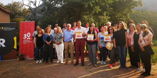 Imatge d'un moment de la jornada de formació i agraïment a les persones, entitats, empreses i escoles que fan possible la iniciativa, celebrada dilluns 25 de juny a la Masia La Muntada.